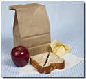 lunch sack, sandwich, and apple