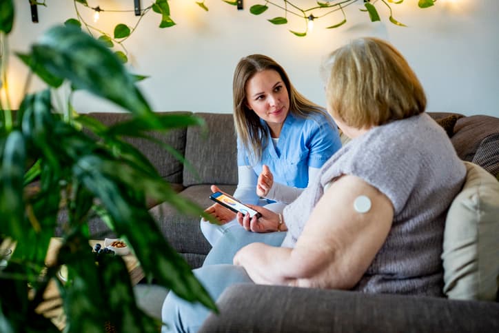 Older woman talking to a provider
