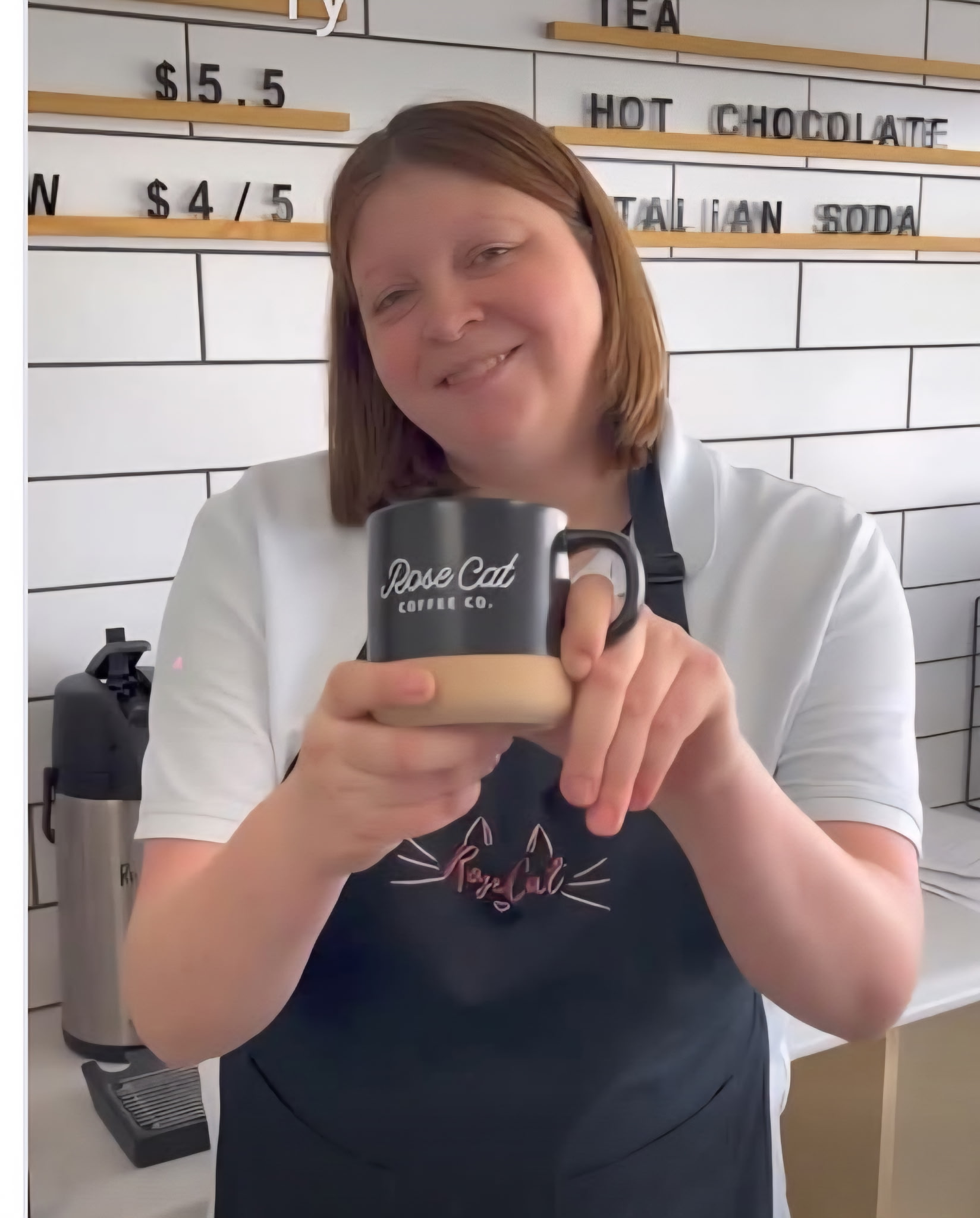 Holding a coffee cup